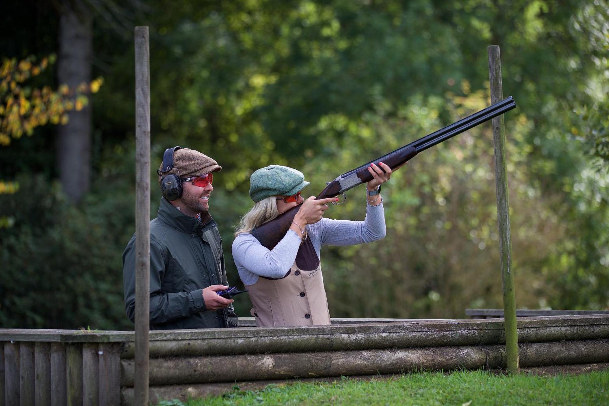 Schloss Roxburghe, Part Of Destination By Hyatt Exterior photo A woman shooting with a shotgun