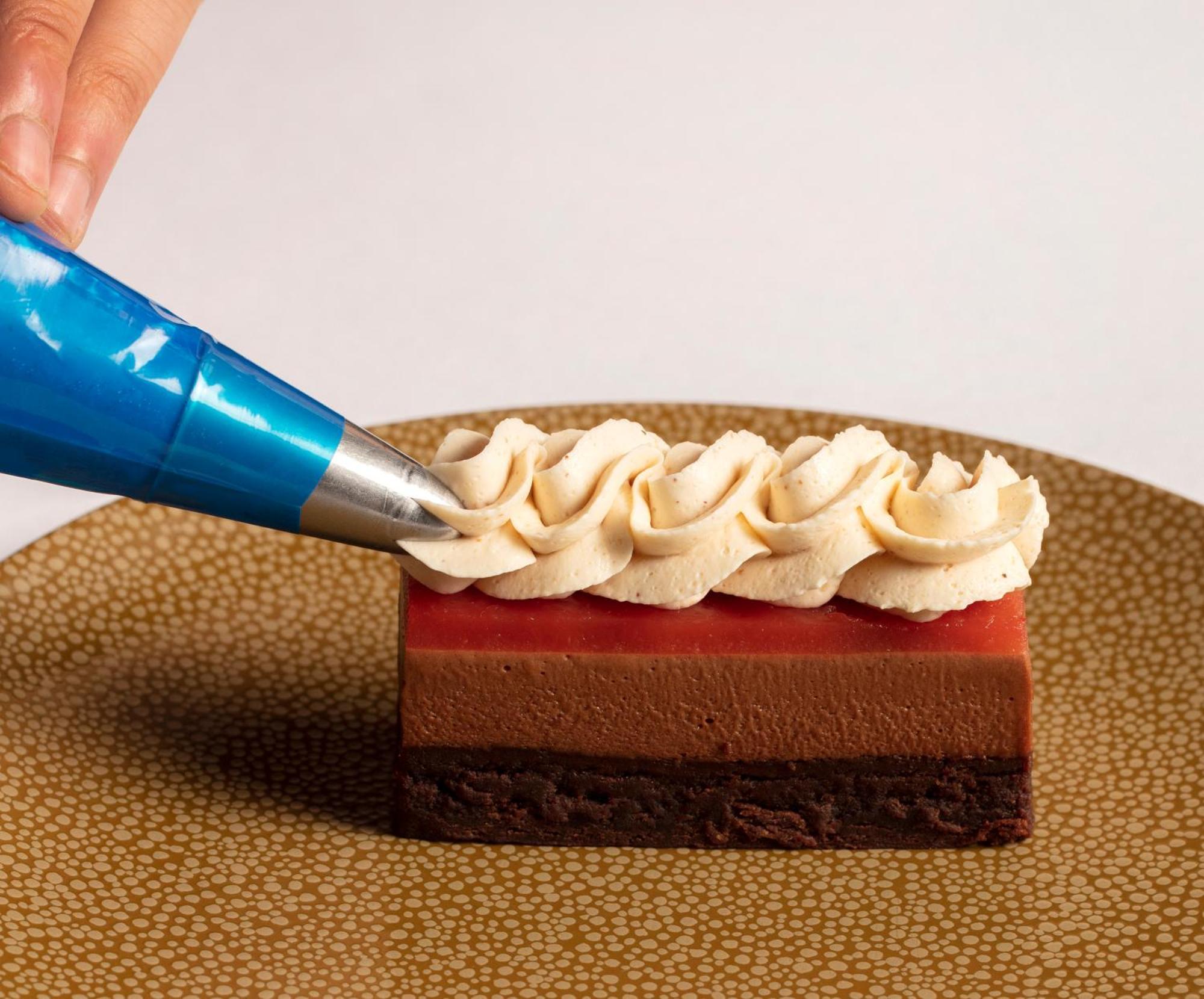Schloss Roxburghe, Part Of Destination By Hyatt Exterior photo A pastry chef icing a dessert