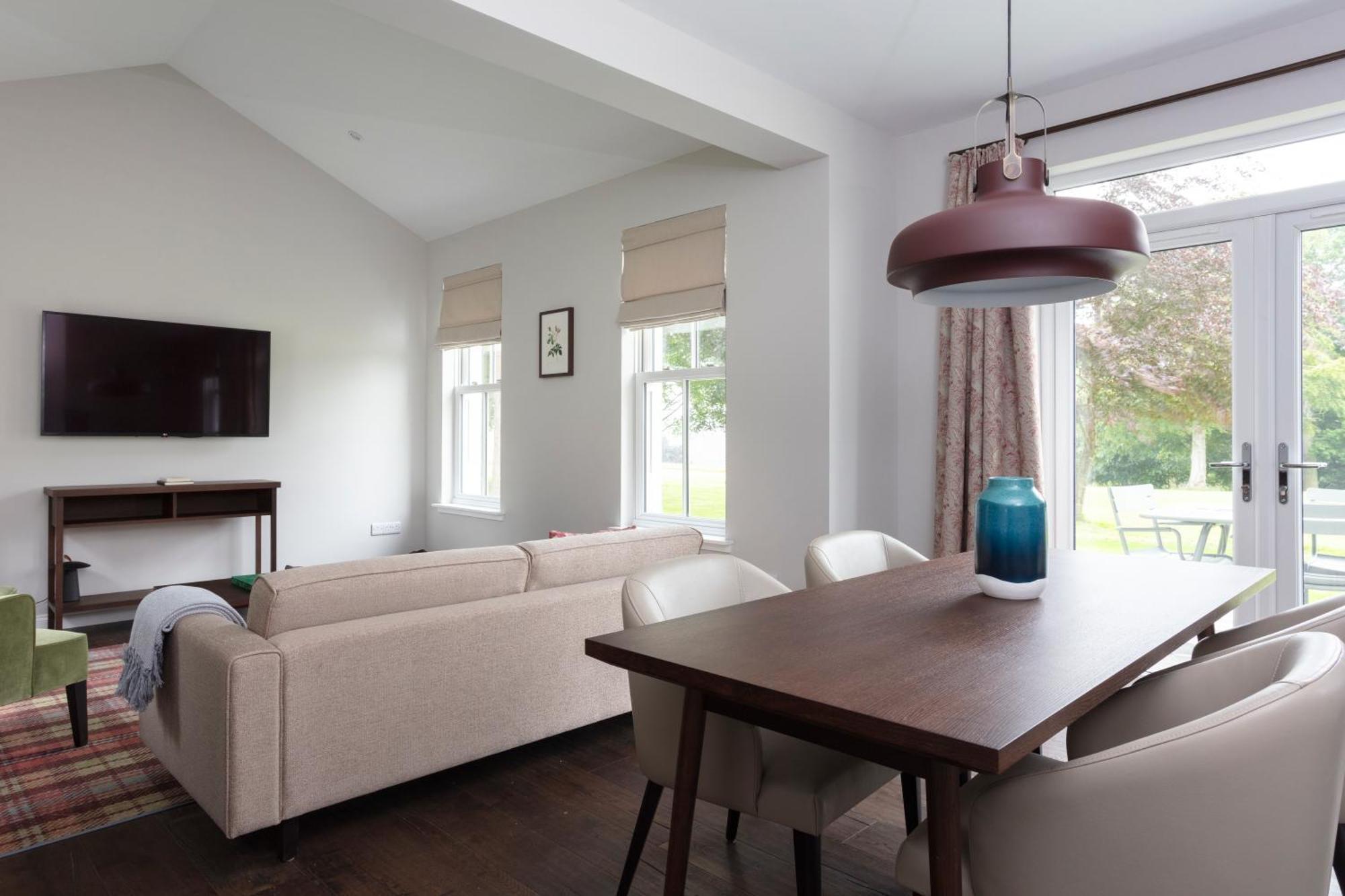 Schloss Roxburghe, Part Of Destination By Hyatt Exterior photo A living room with a sofa and a table